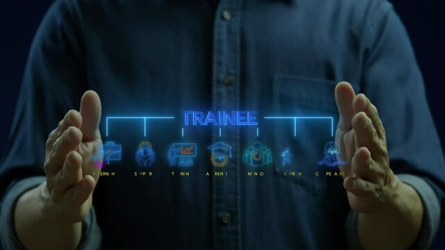 Businessman shows glowing neon line banner of TRAINEE concept with icons of internship, apprentice, training, mentor, support, cooperation and improve on virtual screen.