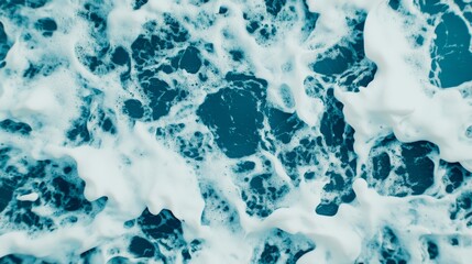 Close-up view of foamy ocean waves.