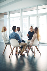 Mentor, team building and talking with business people in office for meeting, training or planning....