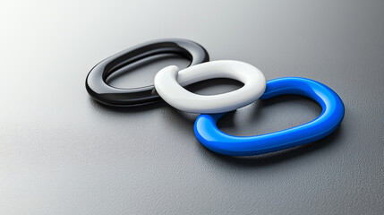 Fototapeta premium Colorful linking shapes on a smooth surface.