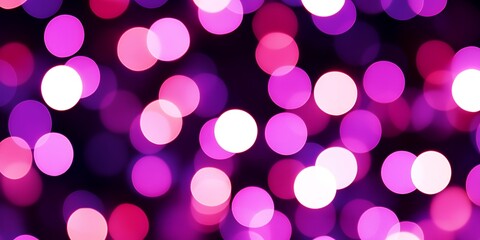 Pink and white bokeh lights on dark background.