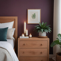 A modern interior guest room featuring a Maple wooden chest of drawers with a dark plum wall.