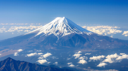 Aerial View of Snow-Capped Mountain Surrounded by White Clouds, Majestic Winter Landscape Panorama.