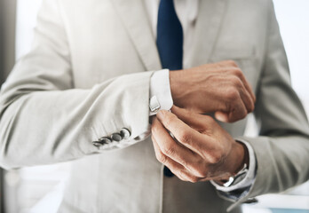 Obraz premium Businessman, dressing and fashion in office for shirt, corporate style and professional with ambition. Formal man, cufflink and confident in workplace for start of work, clothes and designer suit