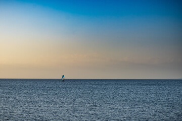Fototapeta premium Mediterranean seascape of Gallura coast with sail boat in northern Sardinia island, Italy