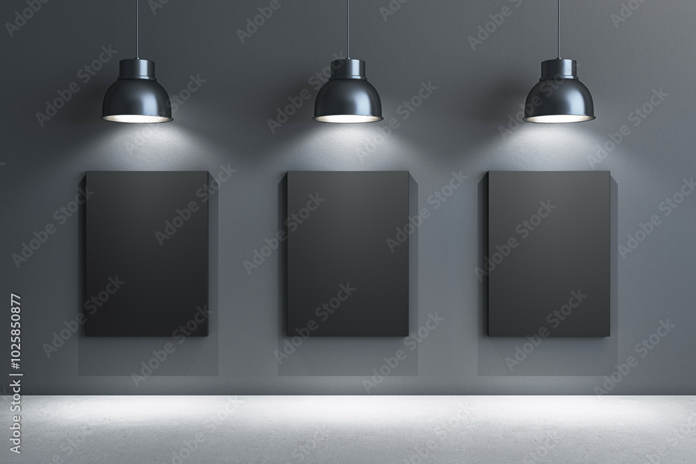 Poster Gallery space with three empty frames illuminated by lamps. 3D Rendering