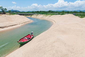 Confluence of River and Sea: Fishing Beach on a Clear Day