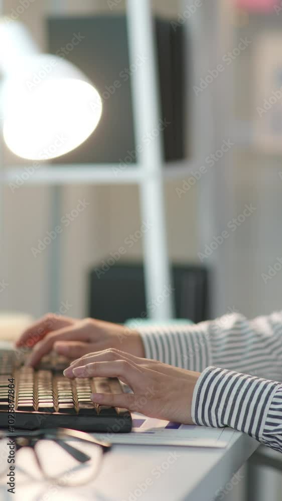 Poster vertical footage of businesswoman is working and typing on computer keyboard and calculator for cost