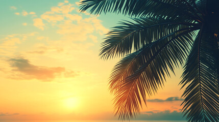 Beautiful tropical sunset with palm trees silhouetted against a colorful sky, creating a serene and tranquil atmosphere. Perfect representation of relaxation and summer vacations.