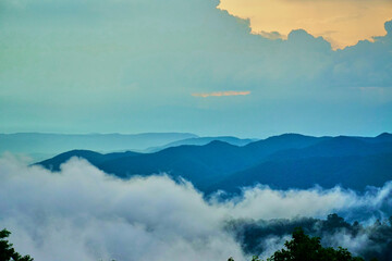 The sky is blue and cloudy with a few clouds in the distance