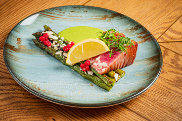 tuna steak with asparagus and sauce