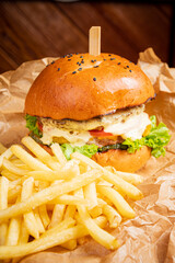 tasty burger with french fries