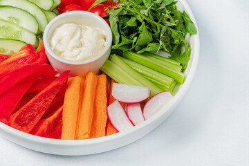 fresh vegetables on the white plate