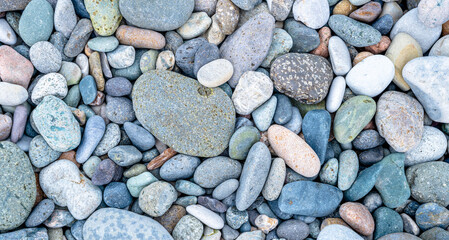 Small sea stones, gravel. Background. Textures