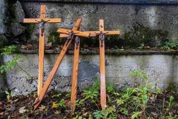 four wooden crosses with Jesus on a defunct hilt