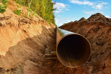 Natural Gas Pipeline Construction site. Transmission in pipe to LNG plant (shipped by LPG tanker)....