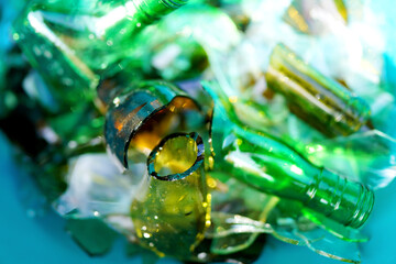Broken glass bottles, background, texture. Broken glass bottles for recycling. Background of broken...