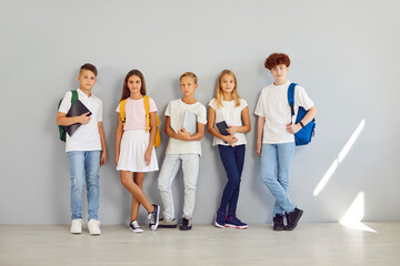 Schoolchildren posing smiling group photo friendship. Group photo of schoolchildren friendship...