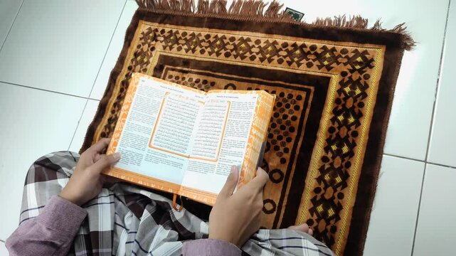 Open the Quran in the middle pages then read it