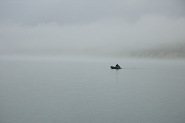 A lonely boat in the fog of Gertner Bay, Magadan.