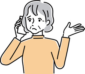 スマホで会話するシニア女性