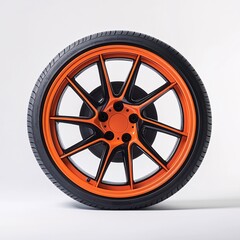 Fototapeta premium Stylish black and orange car wheel on a white isolated background showcasing modern automotive design and aesthetics.