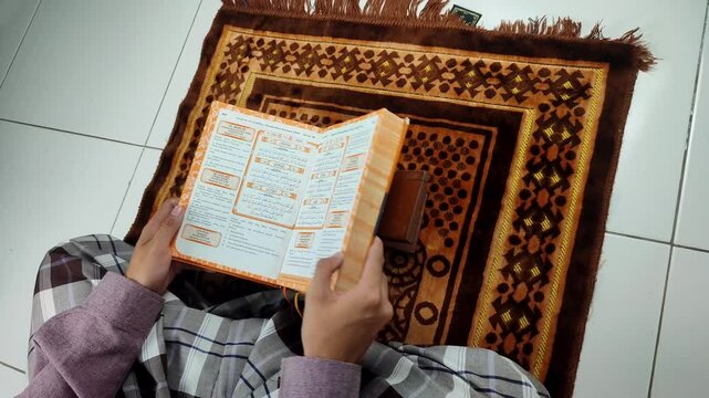 Finish reading the Quran with translation then close it