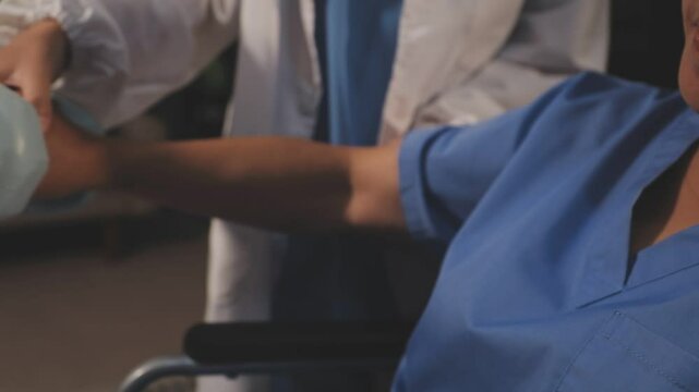 doctor is checking for muscle injuries and using dumbbells test injury and also help with physical therapy strengthen muscles because physical therapy will help strengthen muscles and help blood flow