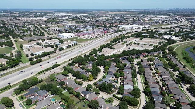 Dallas Fort Worth metroplex rapid growing area Lewisville and Coppell along Highway 12 Sam Rayburn Tollway, commercial building, warehouse logistic center, residential house, DFW landfill, aerial