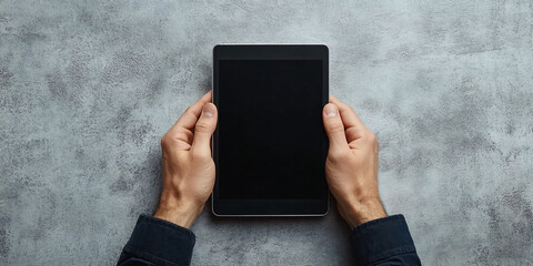 A mockup of a tablet being held by hands with a blank screen.