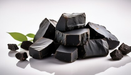 Nature's Strength: Herbal Shilajit Displayed Against a White Backdrop