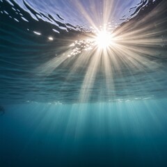 Obraz premium ocean underwater view whith sunrays comming from surface of water
