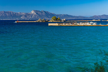 The port of Trpanja and the statue of Our Lady Star of the Sea