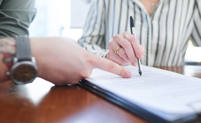 Documents, signature and hands with business people in office for paperwork, negotiation or...