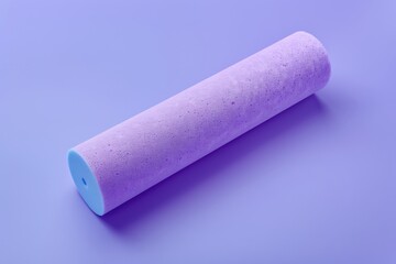 Soft purple foam roller on a pastel background for exercise and relaxation