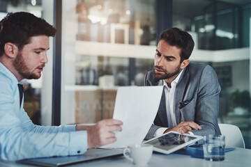 Business man, meeting and document with report for product sales, discussion or performance review. B2B, deal and people with tablet for charts, data or graphs for feedback on profit increase