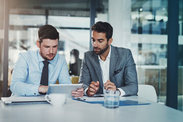 Business, men and planning with documents in office for data analysis on company stats and website traffic performance. Finance team, meeting and paperwork for kpi growth, sales profit and discussion