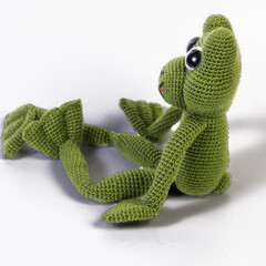 background white isolated frog amigurumi doll sitting