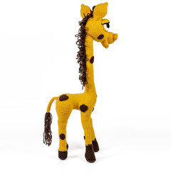 yellow spotted giraffe amigurumi with big eyes background isolated