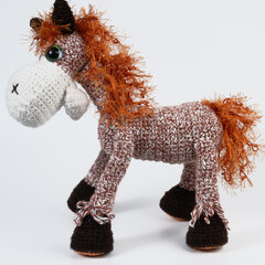 Amigurumi doll horse background white isolated