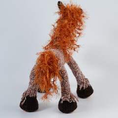 Amigurumi doll horse background white isolated