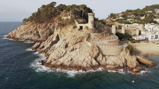 Beautiful castle of Tossa de mar where you can see a sunny day in the summer