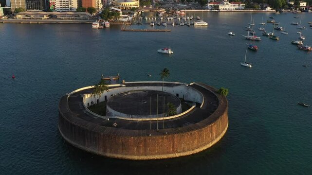 Drone footage of the historic Forte de S&atilde;o Marcelo in Salvador's bay, Bahia, Brazil.