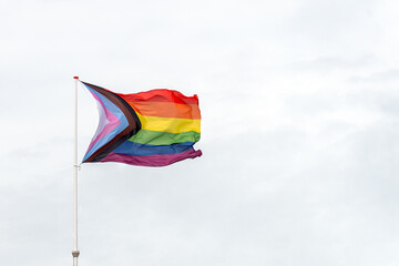 A vibrant display of the rainbow flag, symbolizing LGBTQ+ pride, diversity, and inclusion. The flag celebrates love, equality, and the ongoing fight for human rights, uniting people across the globe.