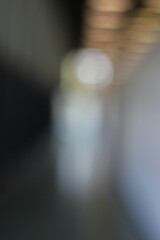 A blurry dreamy view of lights shining on the interior ceiling.