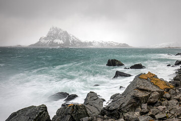 Stormy and rough seas on the Lofoten Islands in winter, very close located to the village of Henningsvaer, Norway.