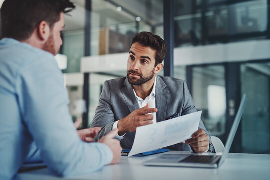 Finance, talking or business people on laptop for documents, research or profit evaluation. Teamwork, advisor and economist planning report paperwork for company revenue, audit results or analysis