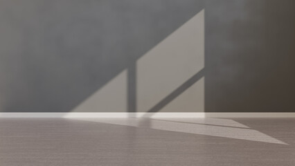 Obraz premium Gray wall illuminated by natural light. Rays of sunlight create a minimalist and cozy environment. Perfect for interior design and advertising projects.