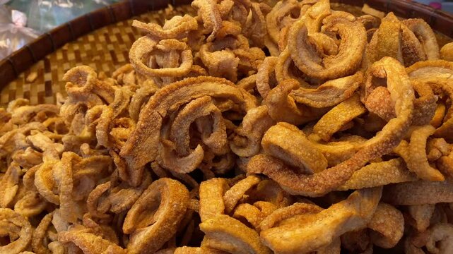 Closeup Traditional fried pork rind.Pork snack made from crispy pork skin.