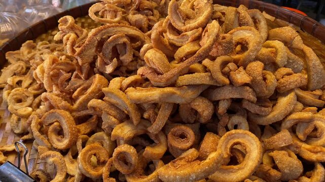 Closeup Traditional fried pork rind.Pork snack made from crispy pork skin.